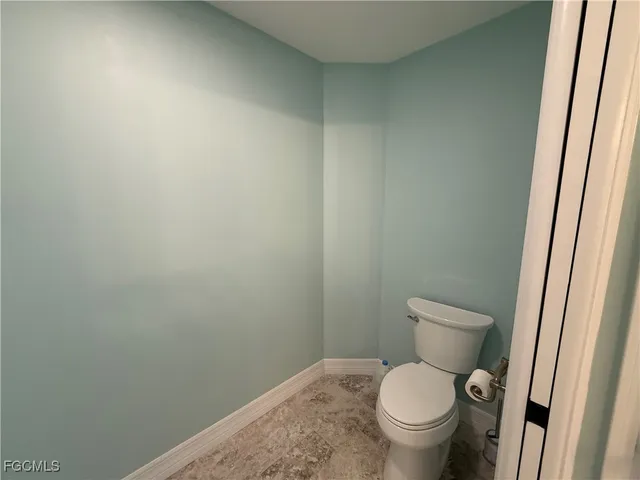 a view of a balcony with wooden floor