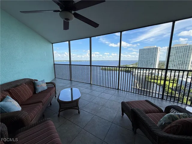 a view of an empty room with a fireplace