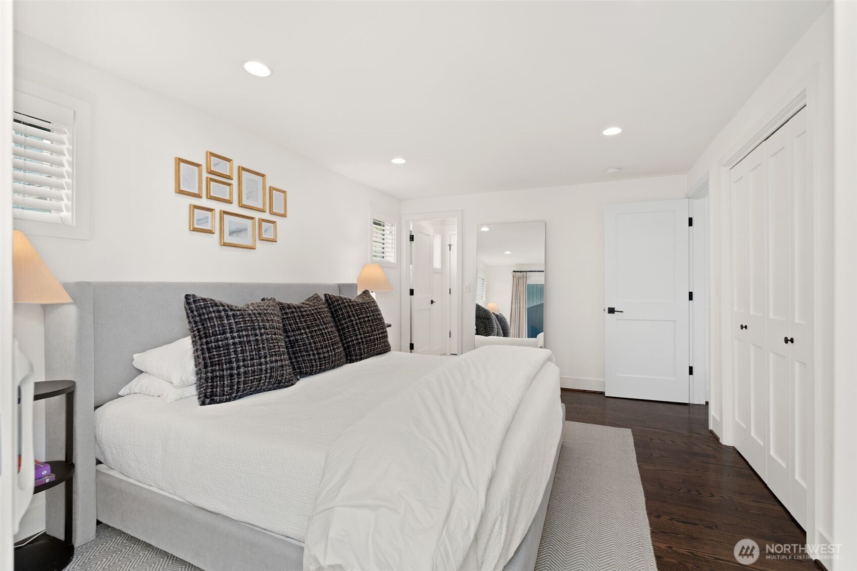 4129 19th Avenue Southwest Seattle, WA 98106 - Photo 17 of 34 a large white bed in a white room