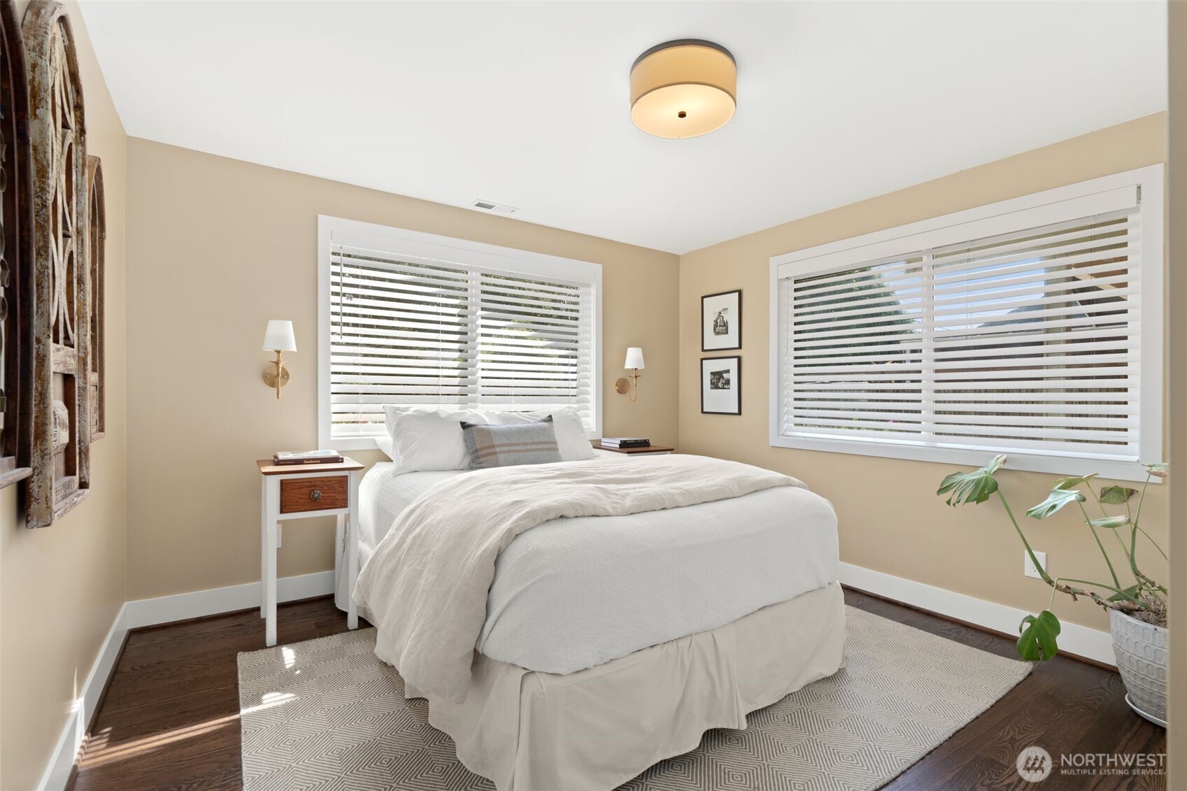 4129 19th Avenue Southwest Seattle, WA 98106 - Photo 18 of 34 a bedroom with a bed and a window