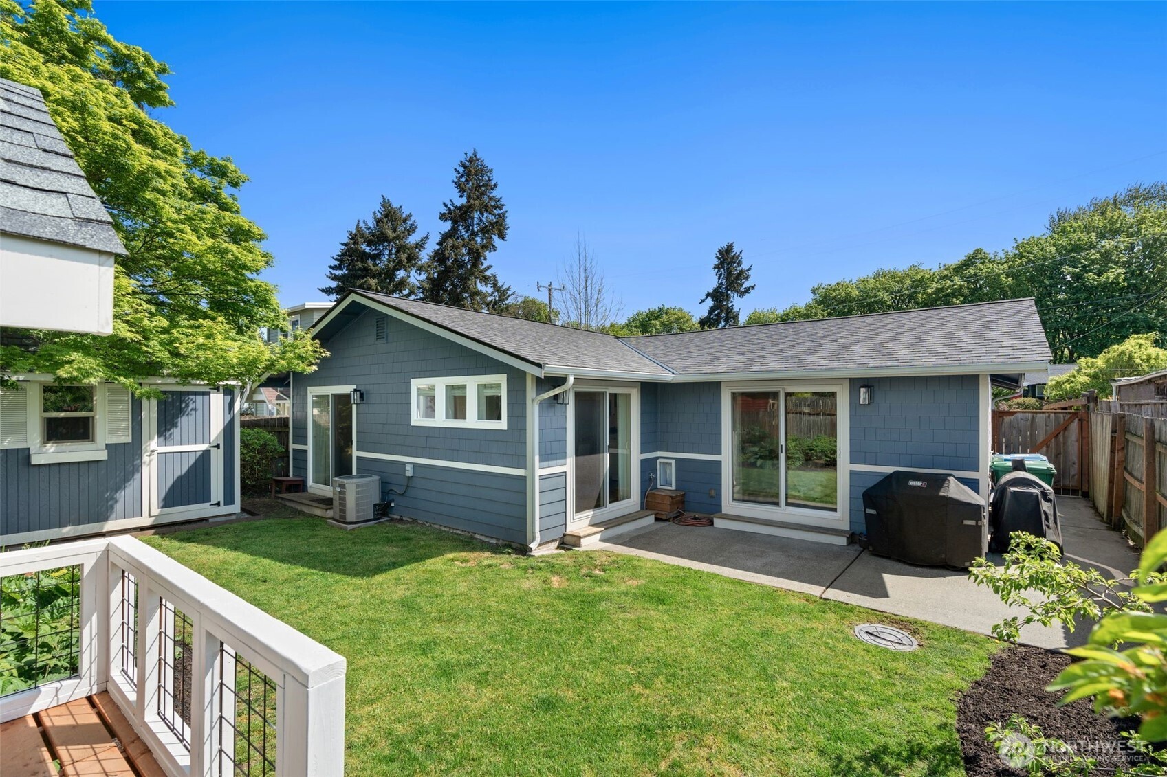 4129 19th Avenue Southwest Seattle, WA 98106 - Photo 27 of 34 a front view of house with a garden