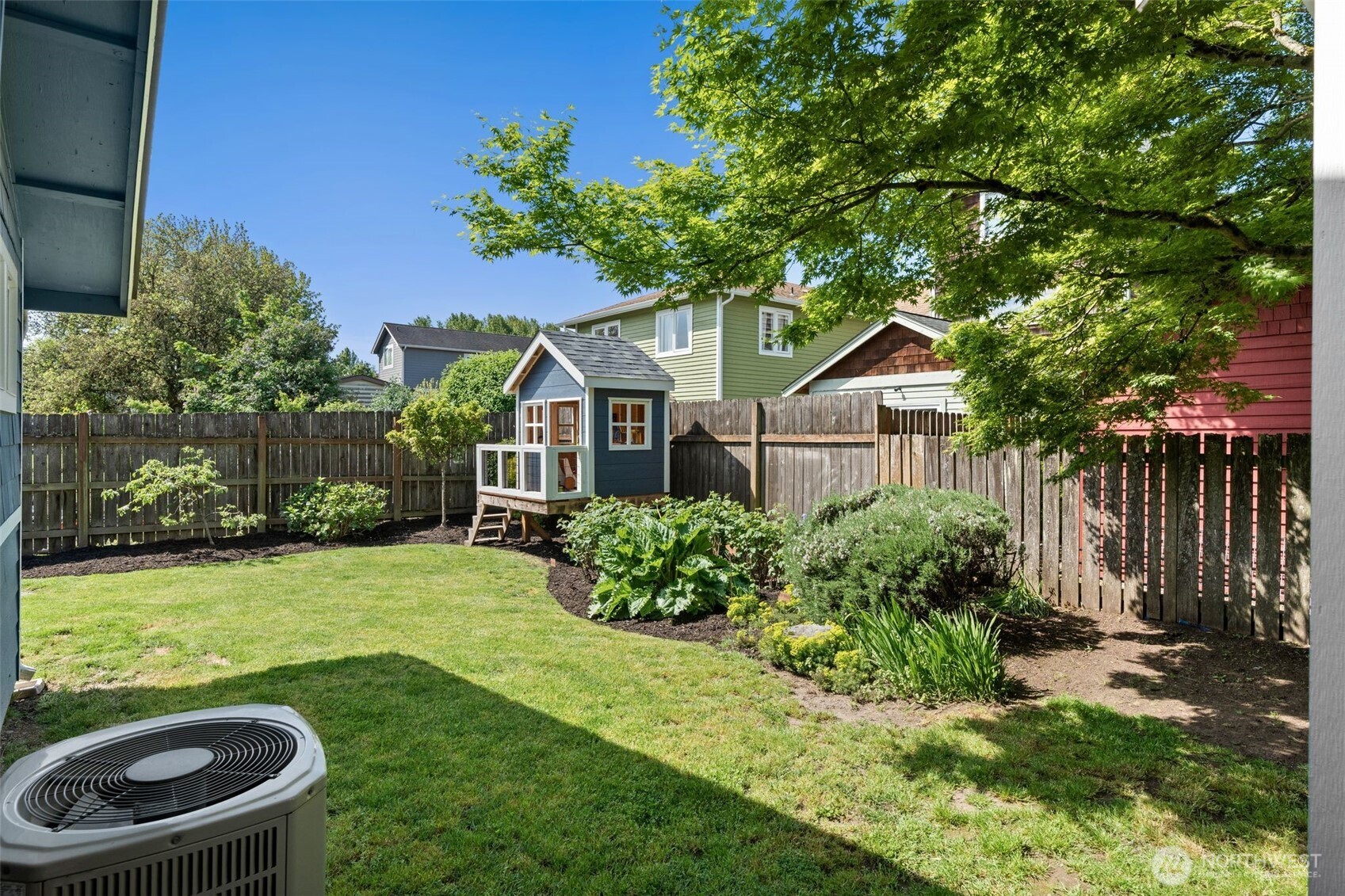 4129 19th Avenue Southwest Seattle, WA 98106 - Photo 28 of 34 a front view of a house with garden