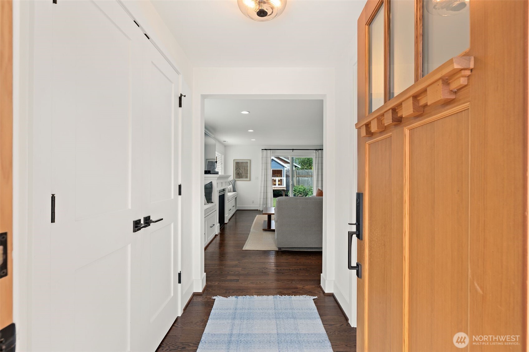 4129 19th Avenue Southwest Seattle, WA 98106 - Photo 3 of 34 a view of a hallway with a dining area