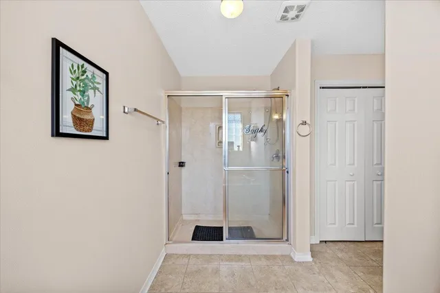 a view of a room with wooden door
