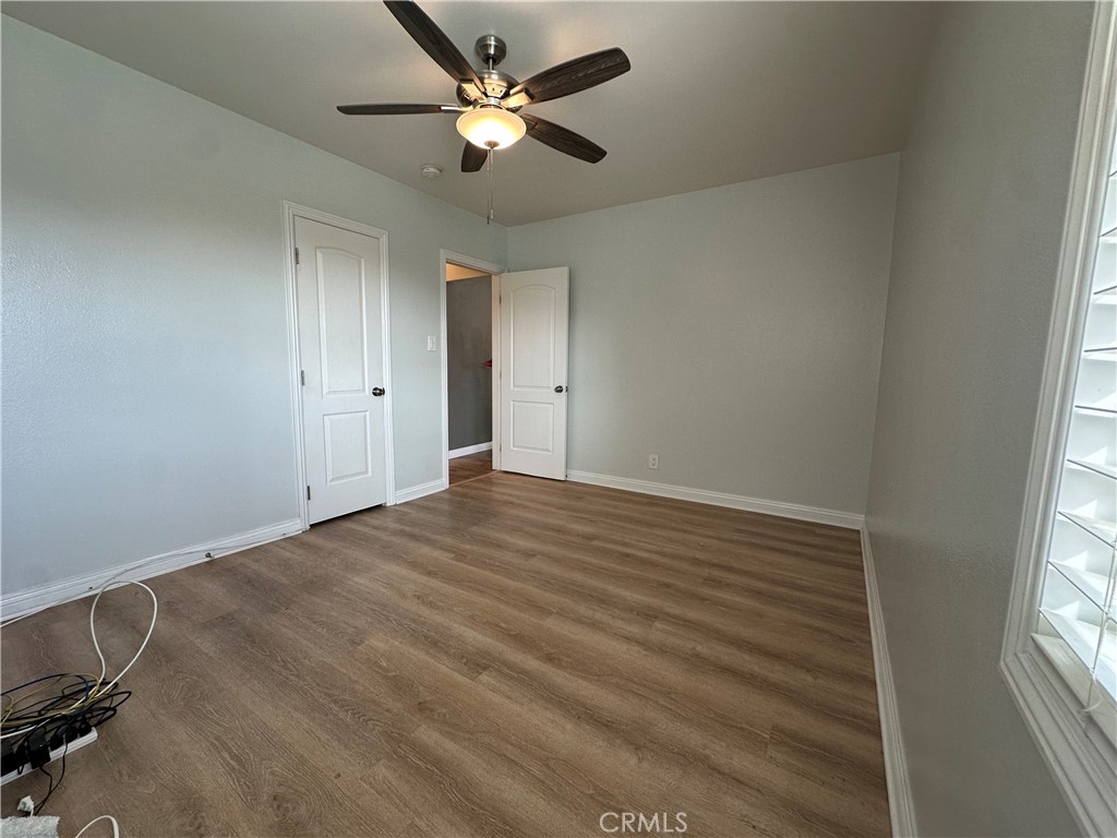 441 Hurstview Avenue Monrovia, CA 91016 - Photo 15 of 16 an empty room with windows and fan