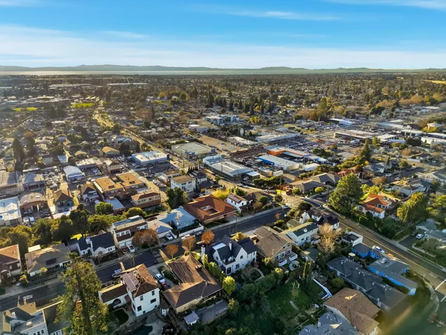 an aerial view of residential building with parking space