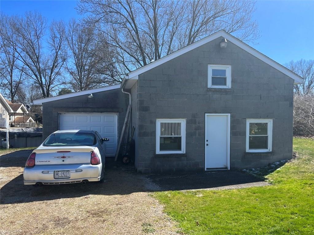 154 Ferncliff Road Rices Landing, PA 15357 - Photo 6 of 23 a car parked in front of a house