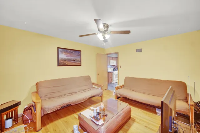 a living room with couches and a coffee table
