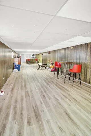 a living room with furniture and a table