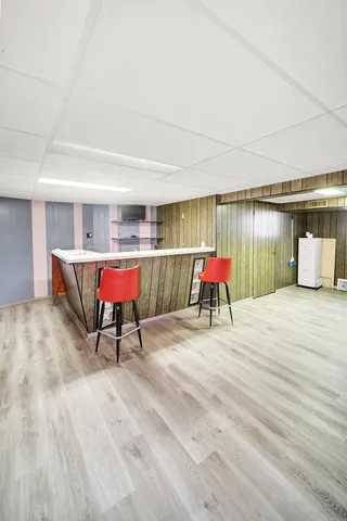 a room with furniture and wooden floor