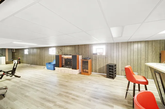 a view of a room with furniture and entryway