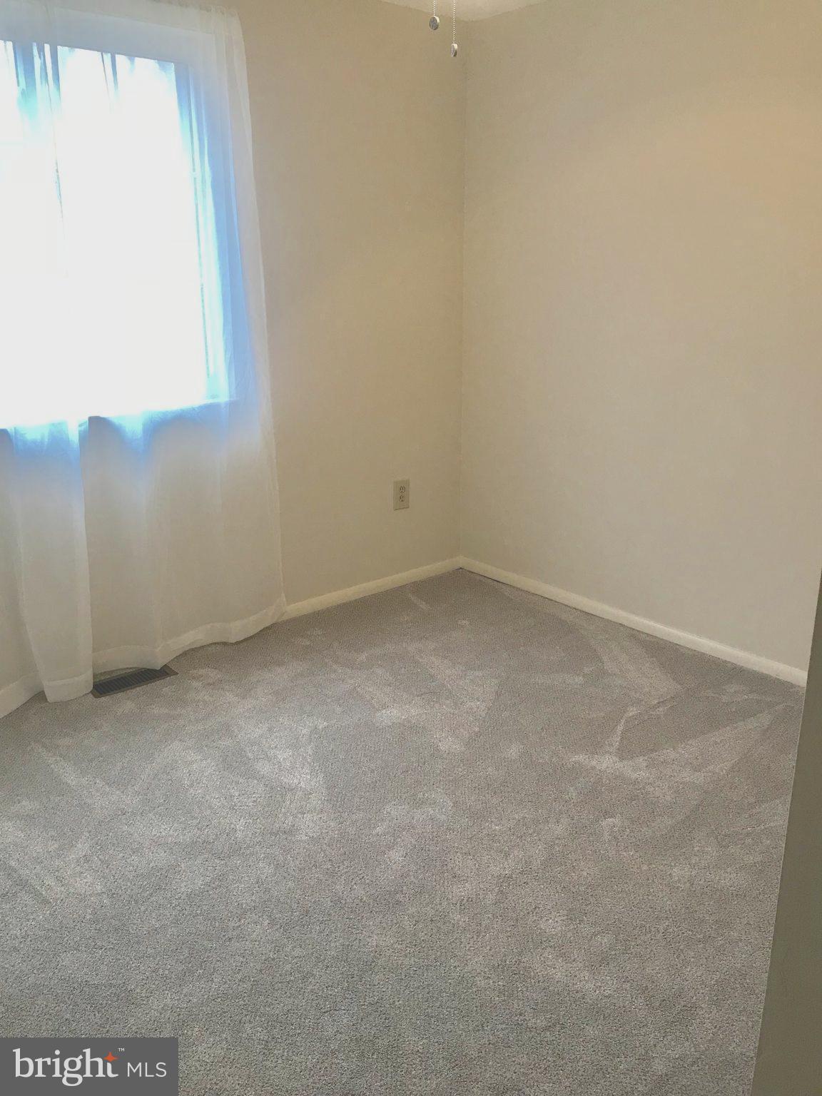 6214 Hillside Road Springfield, VA 22152 - Photo 14 of 22 an empty room with a window