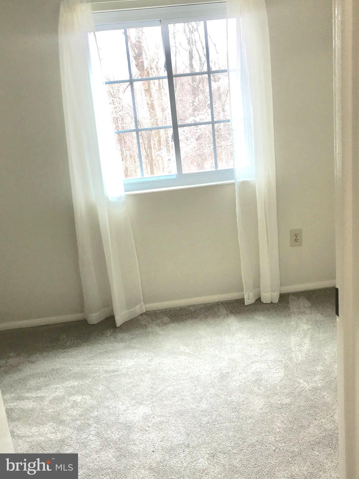 6214 Hillside Road Springfield, VA 22152 - Photo 15 of 22 an empty room with a window