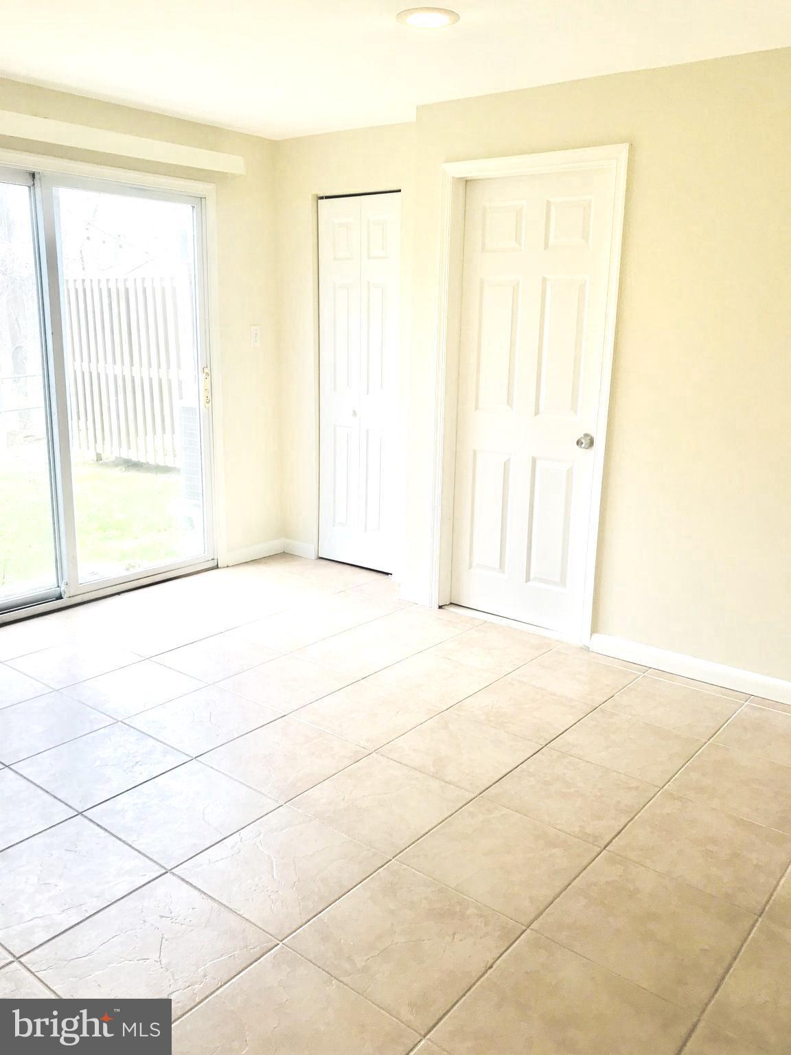 6214 Hillside Road Springfield, VA 22152 - Photo 19 of 22 a view of an empty room with a window