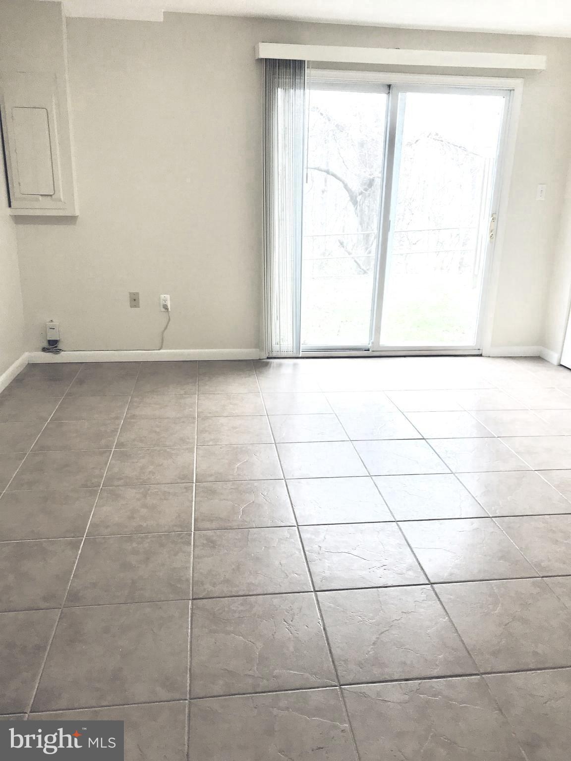6214 Hillside Road Springfield, VA 22152 - Photo 20 of 22 a view of a room with an empty space and window
