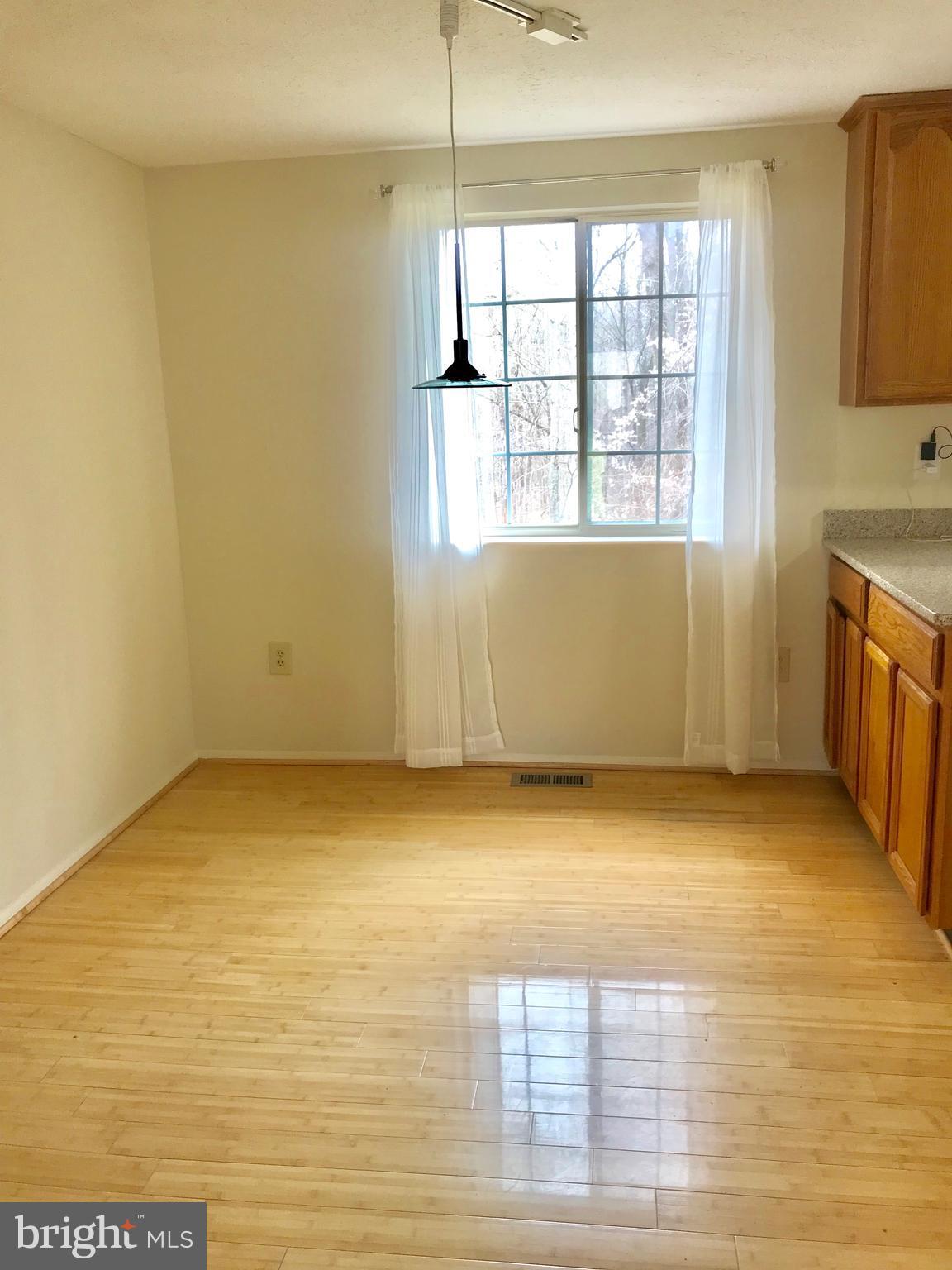 6214 Hillside Road Springfield, VA 22152 - Photo 7 of 22 a view of an empty room with a window