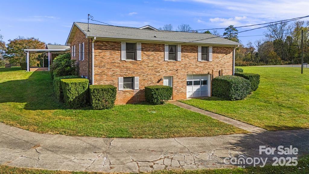 7 Brookshire Road Leicester, NC 28748 - Photo 30 of 40 a front view of a house with a garden