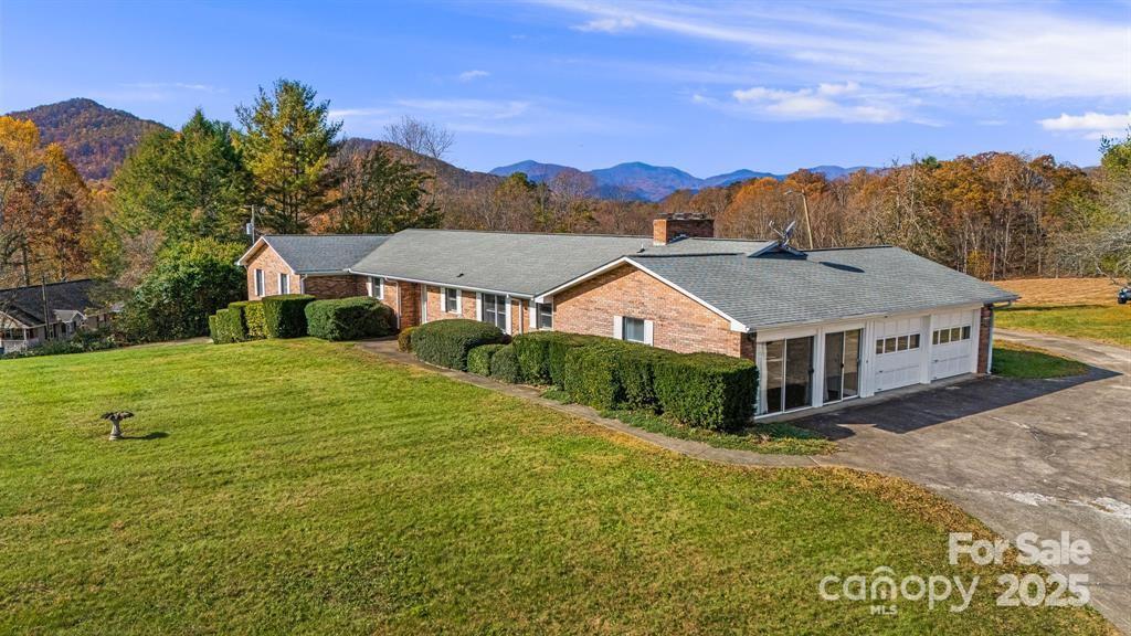 7 Brookshire Road Leicester, NC 28748 - Photo 37 of 40 a view of house with garden