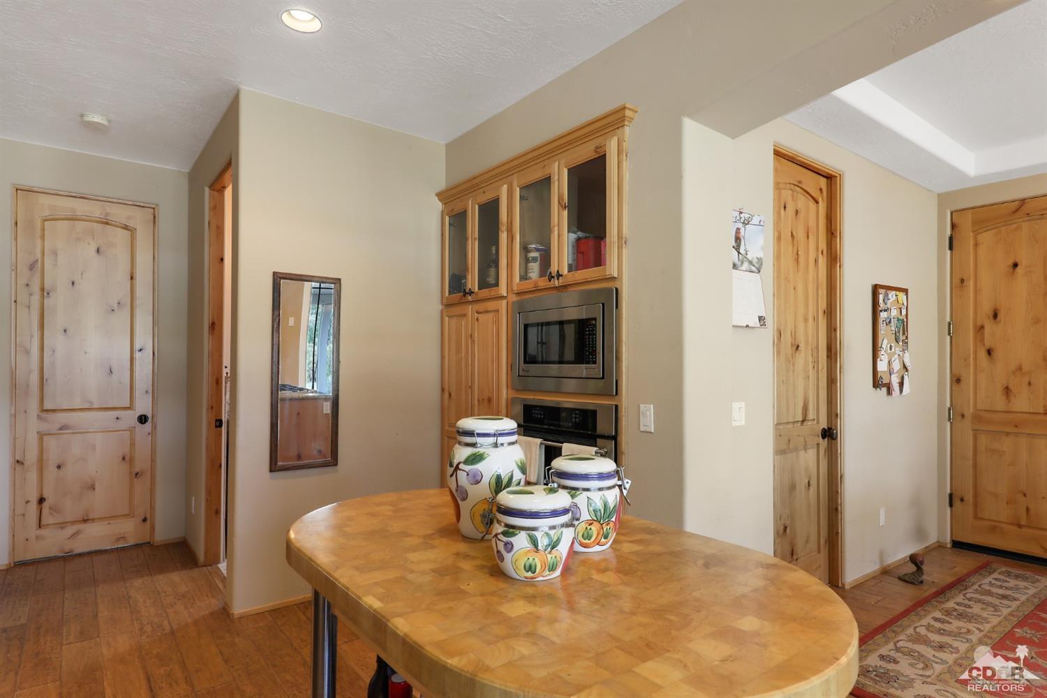 59870 Devils Ladder Road Mountain Center, CA 92561 - Photo 12 of 31 a dining room with furniture and window