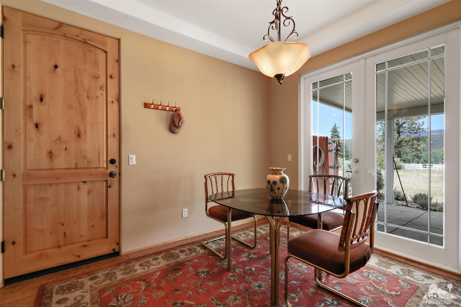59870 Devils Ladder Road Mountain Center, CA 92561 - Photo 13 of 31 a dining room with furniture and window