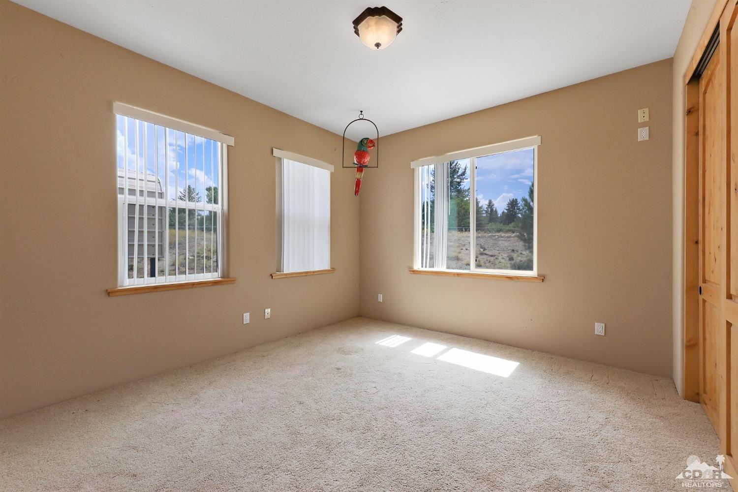 59870 Devils Ladder Road Mountain Center, CA 92561 - Photo 19 of 31 a view of an empty room with windows
