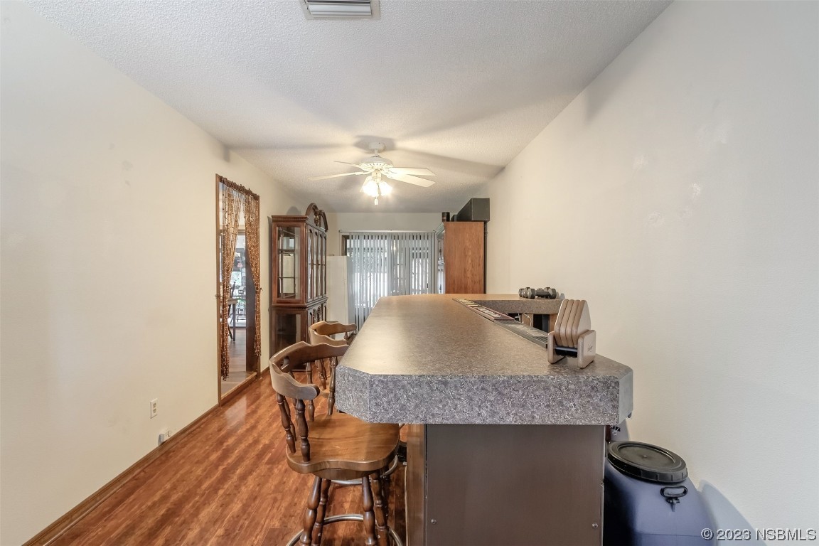 2804 Mango Tree Drive Edgewater, FL 32141 - Photo 21 of 29 a table and chairs in a room