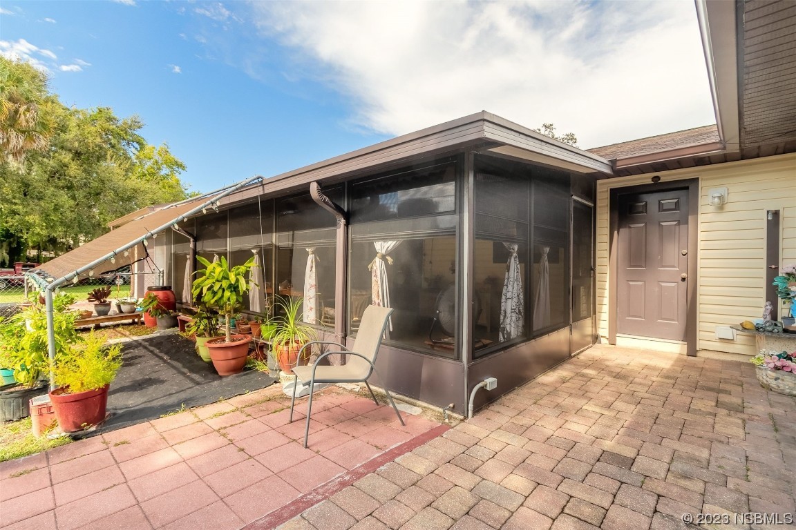 2804 Mango Tree Drive Edgewater, FL 32141 - Photo 27 of 29 a view of house with outdoor seating space