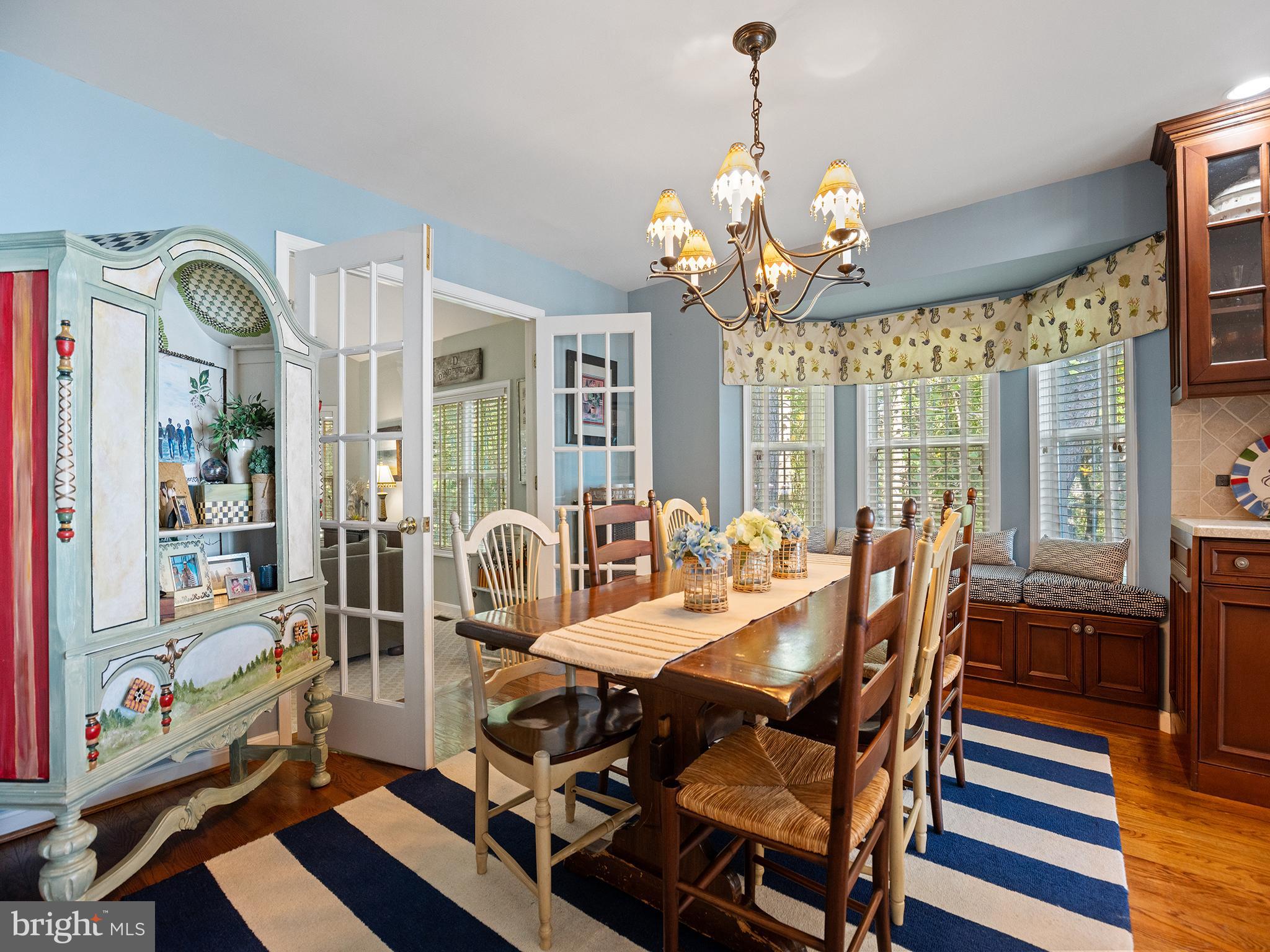 12964 Pine Place Lusby, MD 20657 - Photo 26 of 63 Dining room with window seat, French doors to LR