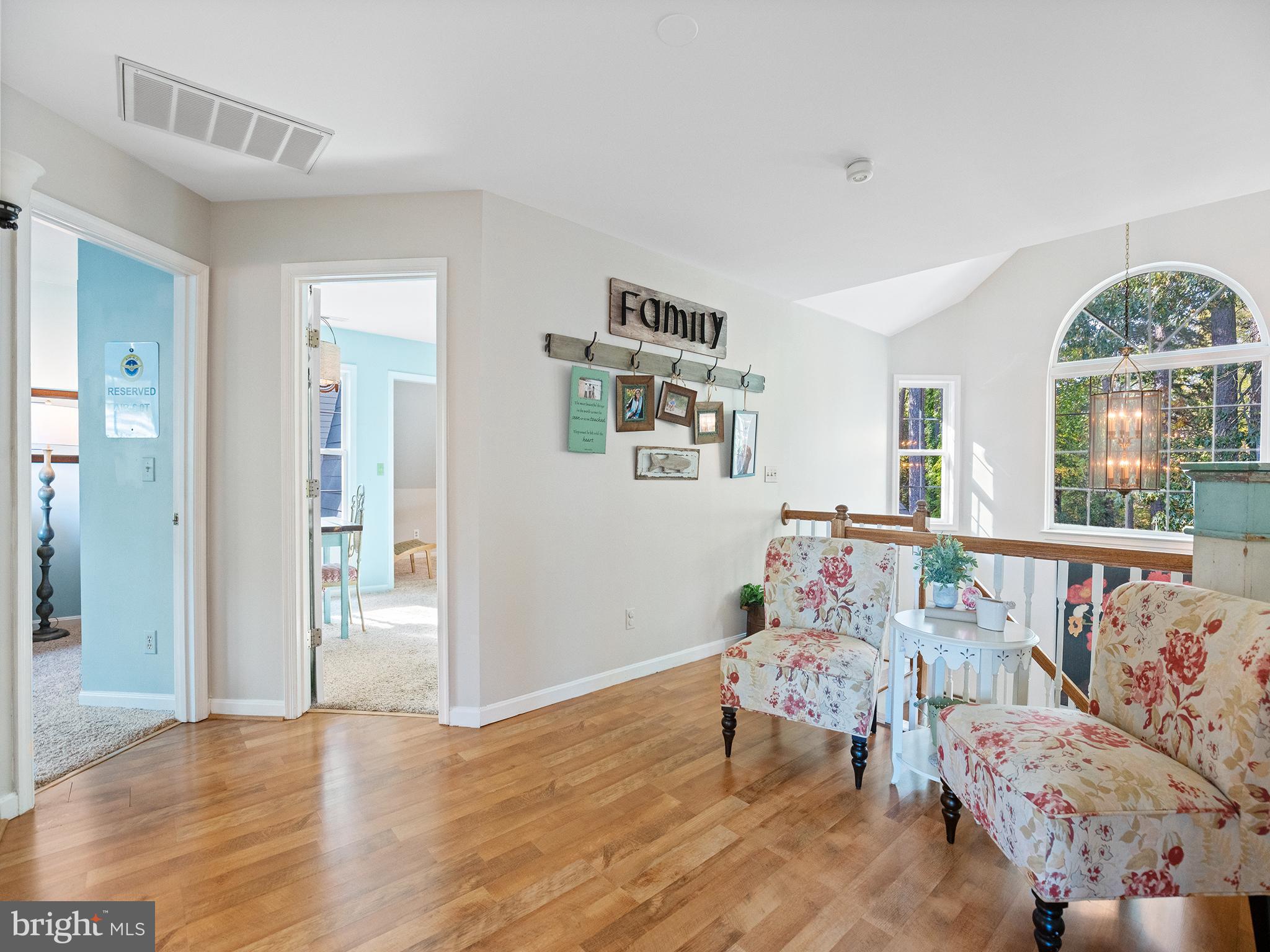 12964 Pine Place Lusby, MD 20657 - Photo 39 of 63 Upstairs landing looking to bedrooms 2 and 3.