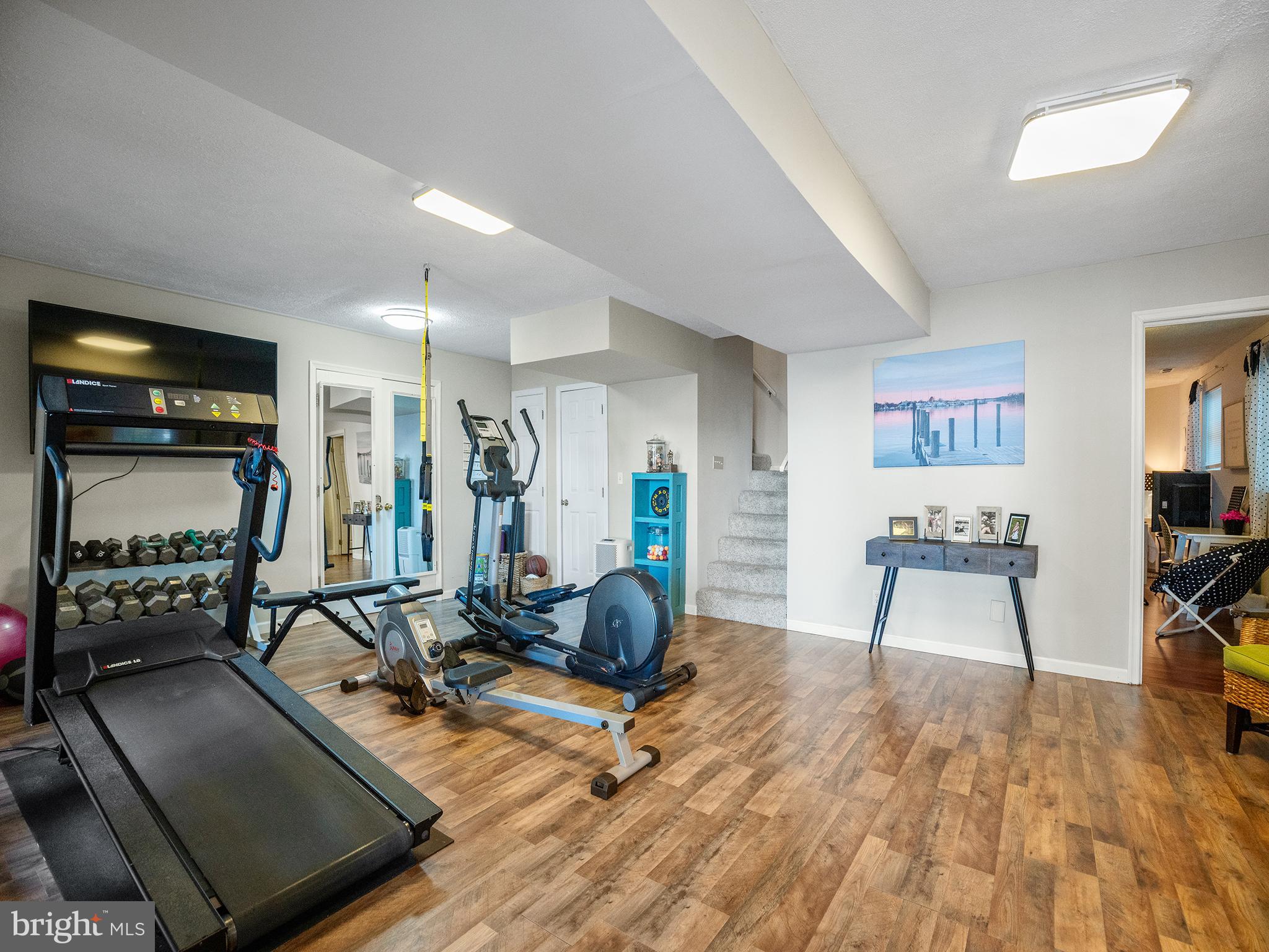 12964 Pine Place Lusby, MD 20657 - Photo 45 of 63 Lower level rec area, bedroom 4 entry.