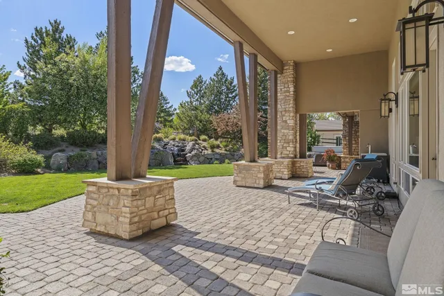 a living room with furniture and garden