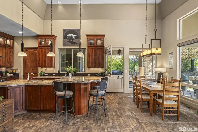a view of a dining area with furniture window and wooden floor