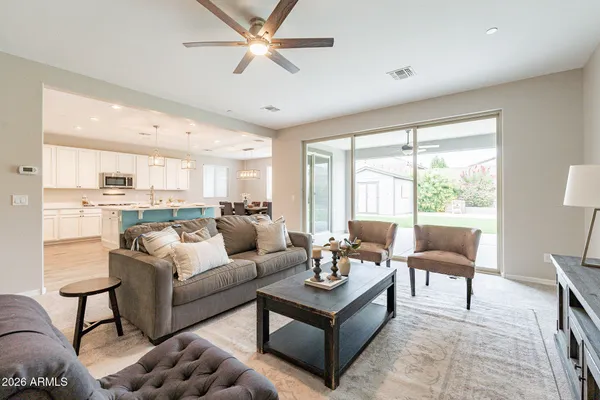 a living room with furniture and a window
