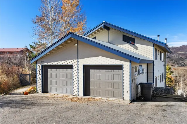 a front view of a house with a garage