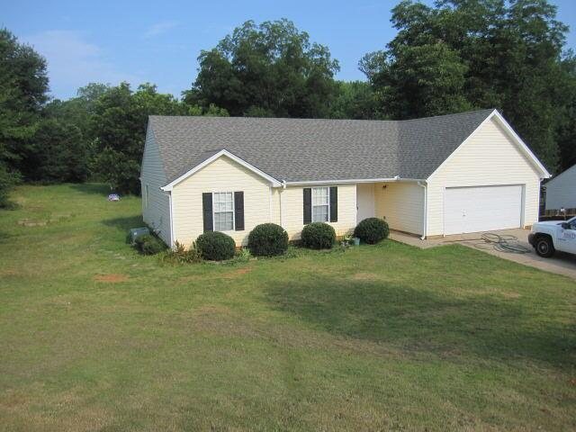 500 Stoney Creek Road Winder, GA 30680 - Photo 1 of 1 a view of a house with a back yard