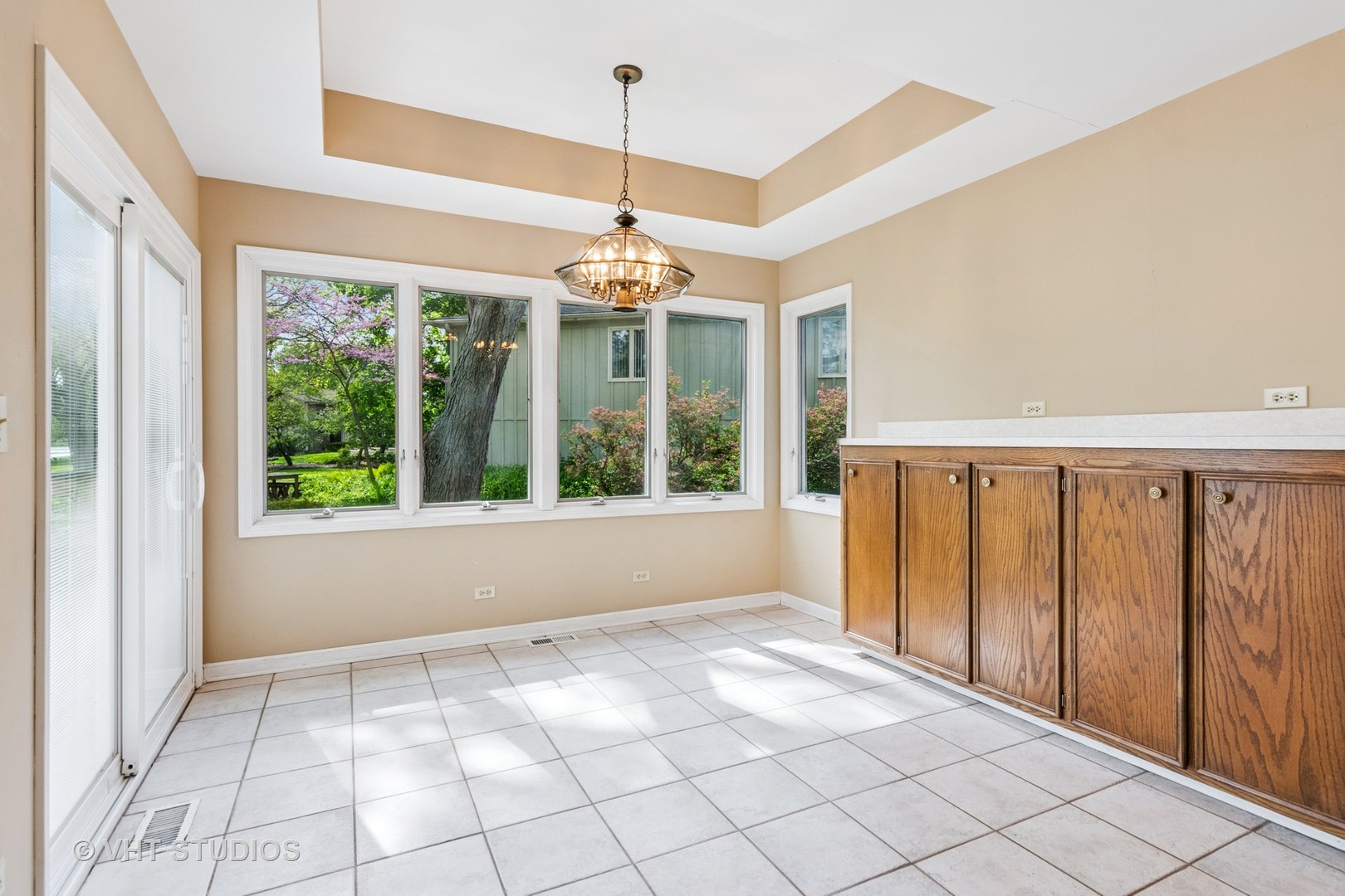 1490 Briar Cove Wheaton, IL 60189 - Photo 9 of 22 a view of an empty room with a window