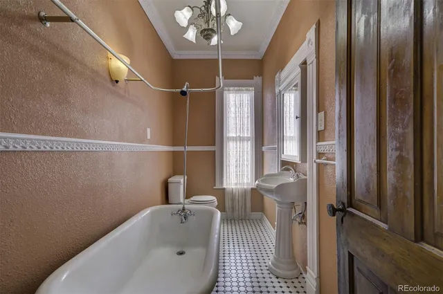 a bathroom with a bathtub and shower