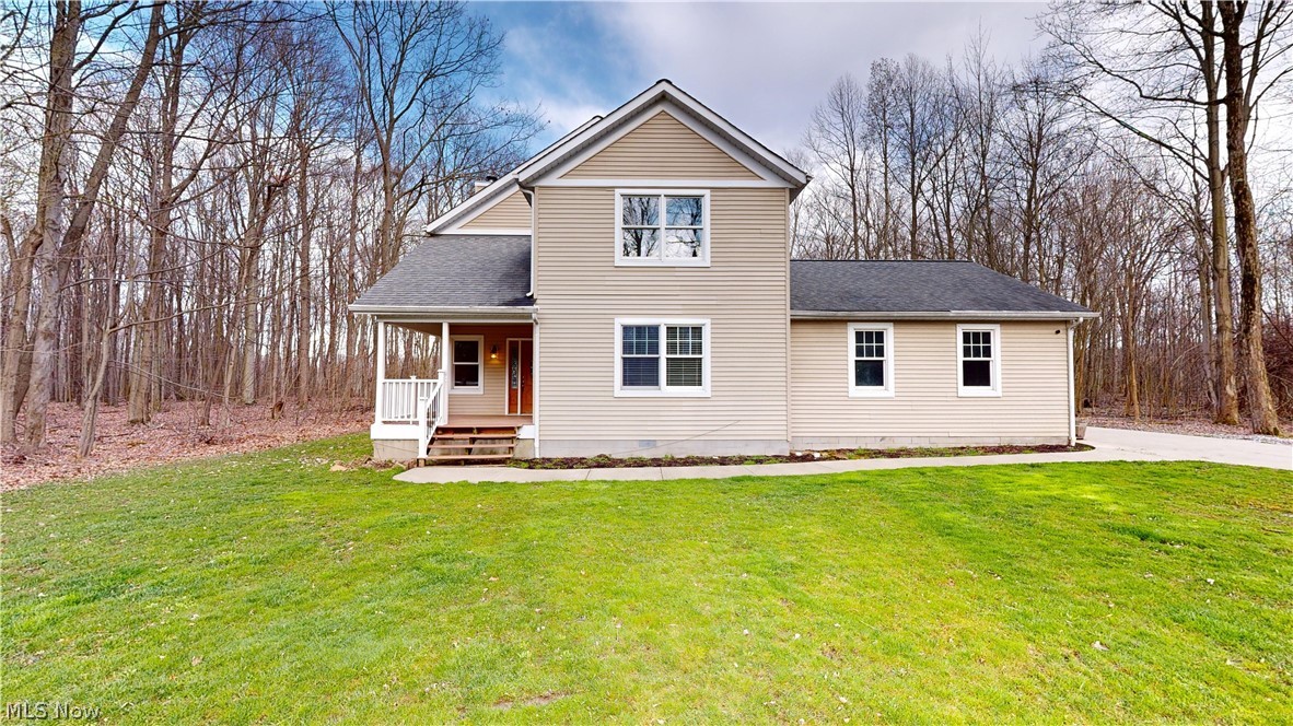 15548 Trask Road Thompson, OH 44086 - Photo 1 of 31 View of property with a front yard and a porch