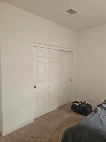 a bedroom with a bed