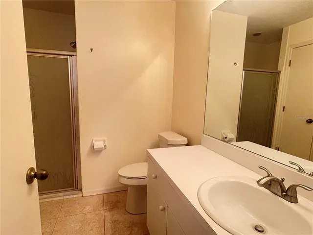 a bathroom with a sink and toilet