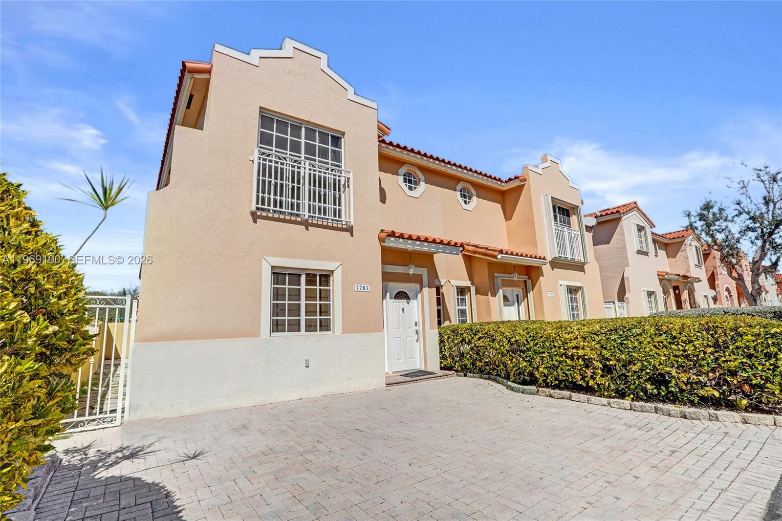 7783 Southwest 94th Lane, Unit 7783 Miami, FL 33156 - Photo 1 of 30 a front view of a building