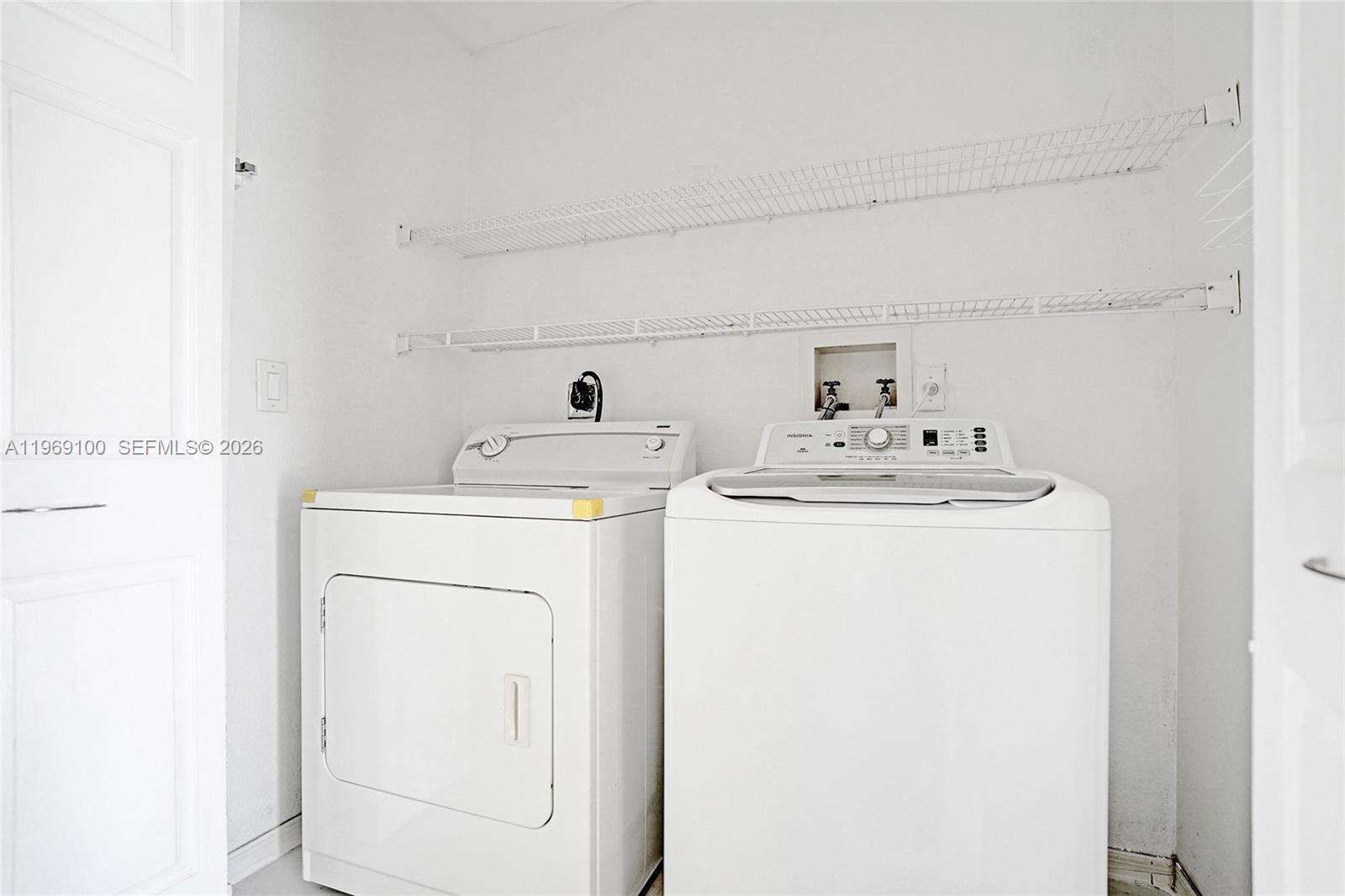 7783 Southwest 94th Lane, Unit 7783 Miami, FL 33156 - Photo 20 of 30 a utility room with dryer and washer