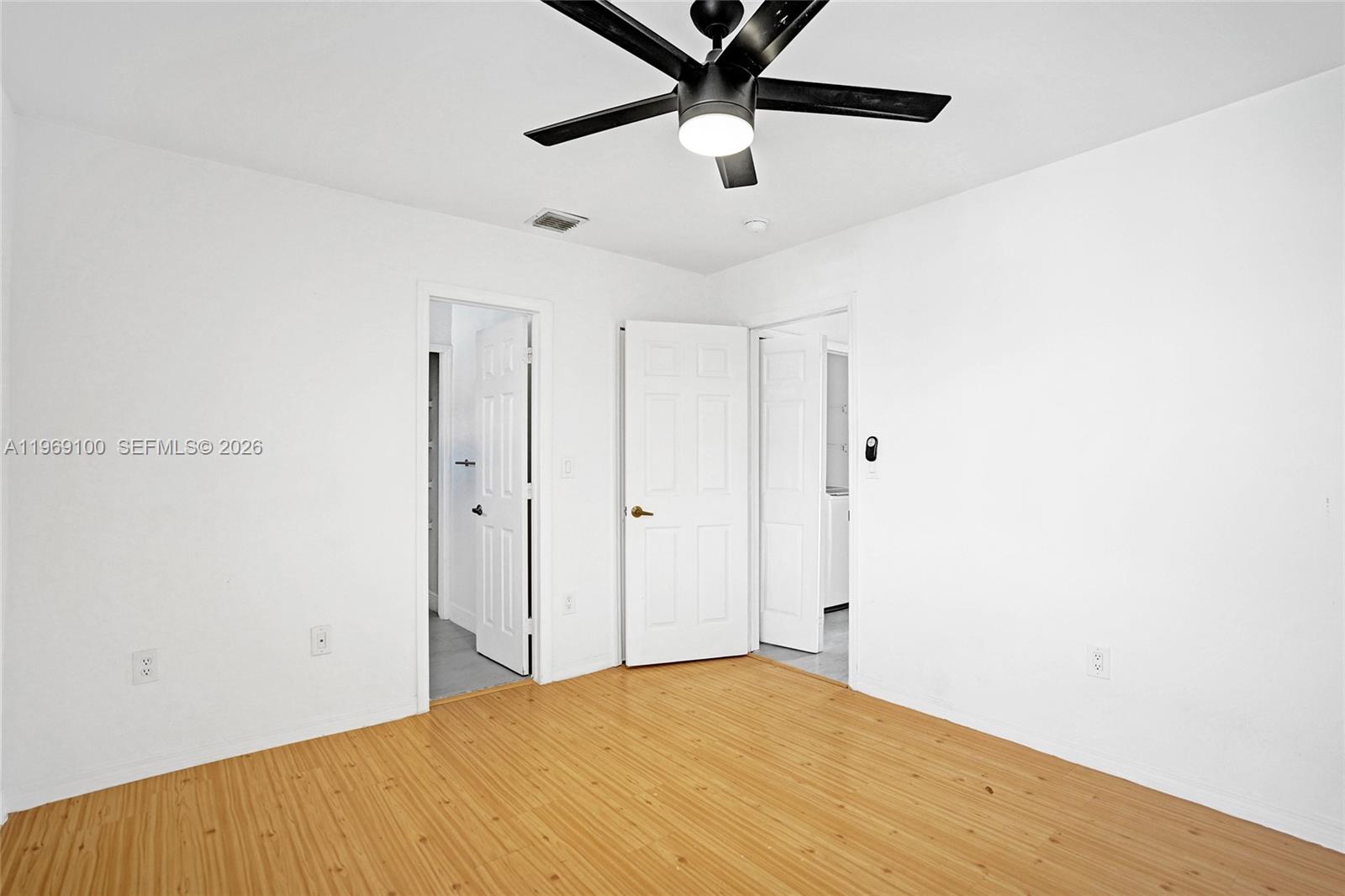 7783 Southwest 94th Lane, Unit 7783 Miami, FL 33156 - Photo 22 of 30 a view of a room with a ceiling fan