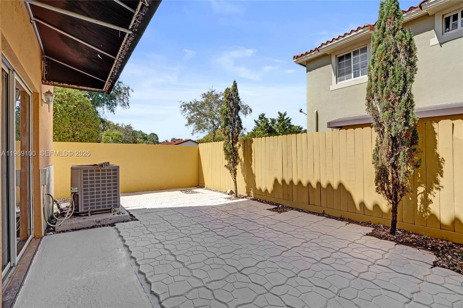 7783 Southwest 94th Lane, Unit 7783 Miami, FL 33156 - Photo 27 of 30 a view of outdoor space and yard