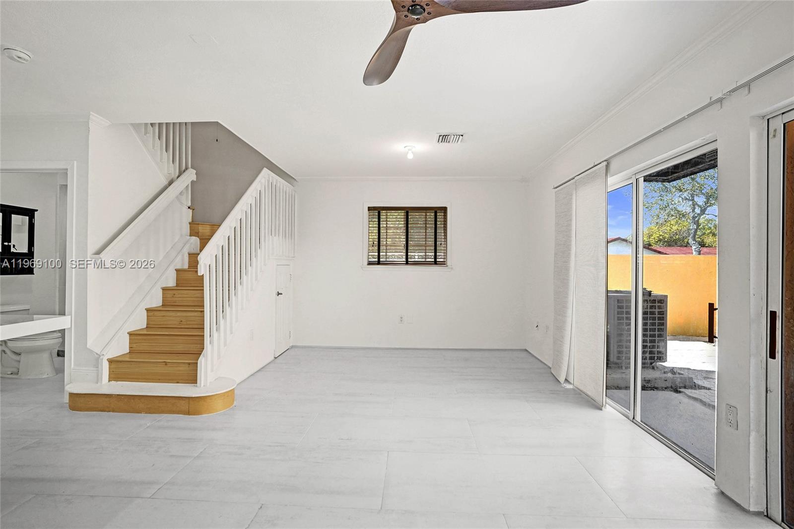 7783 Southwest 94th Lane, Unit 7783 Miami, FL 33156 - Photo 9 of 30 a view of an entryway with staircase