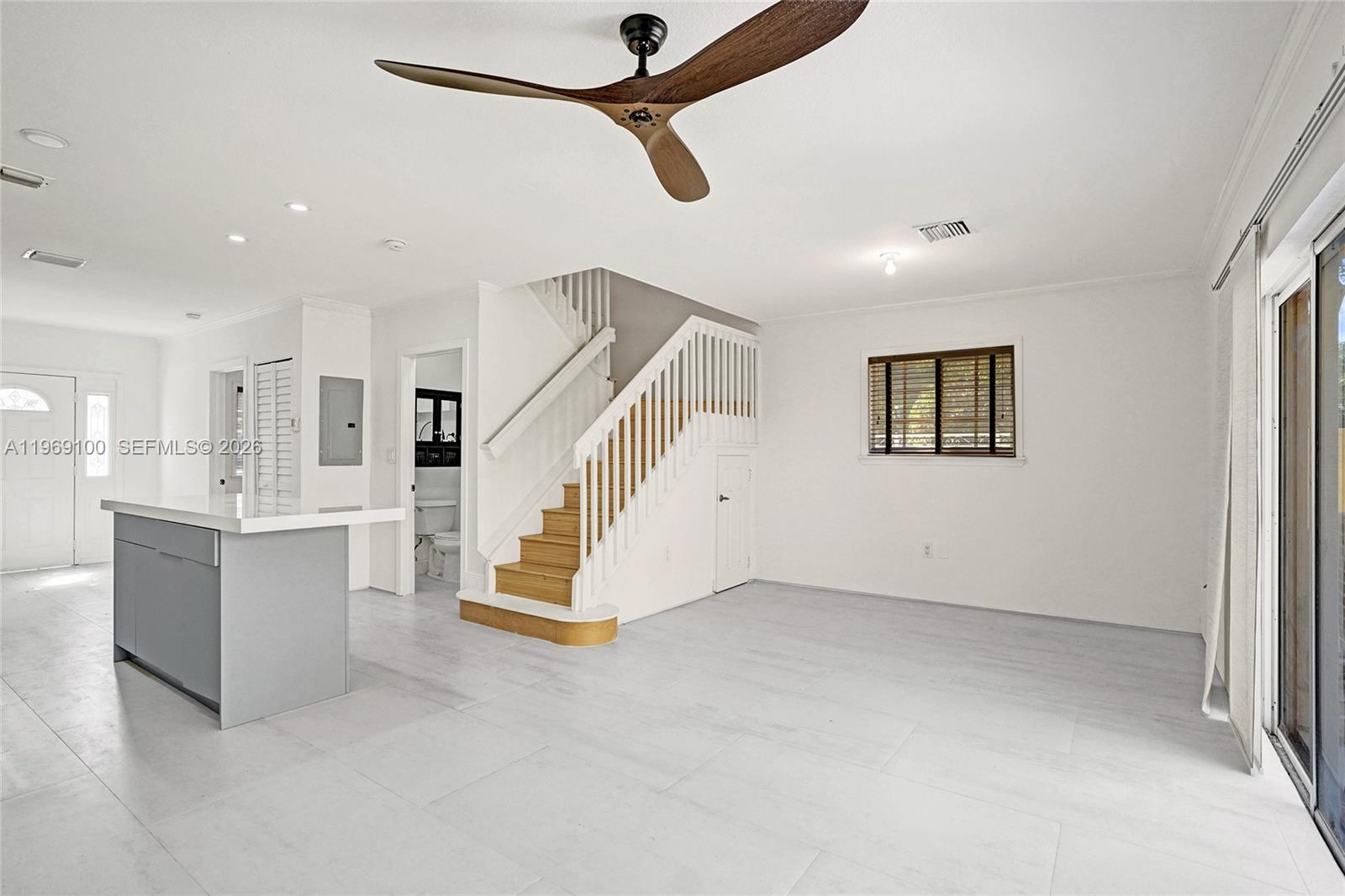 7783 Southwest 94th Lane, Unit 7783 Miami, FL 33156 - Photo 10 of 30 a view of an entryway with kitchen and a window