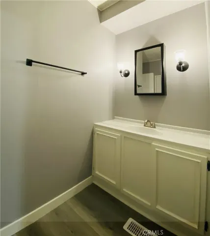 a view of a room with rack on the wall