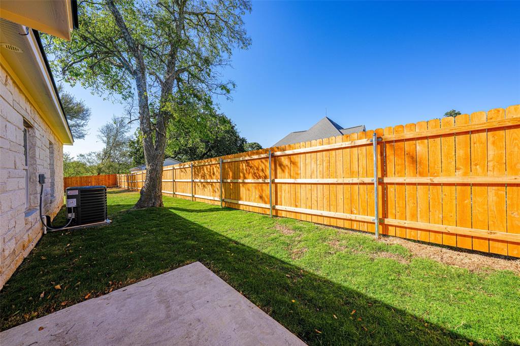103 South Barron Street Covington, TX 76636 - Photo 15 of 16 a view of an outdoor space and yard