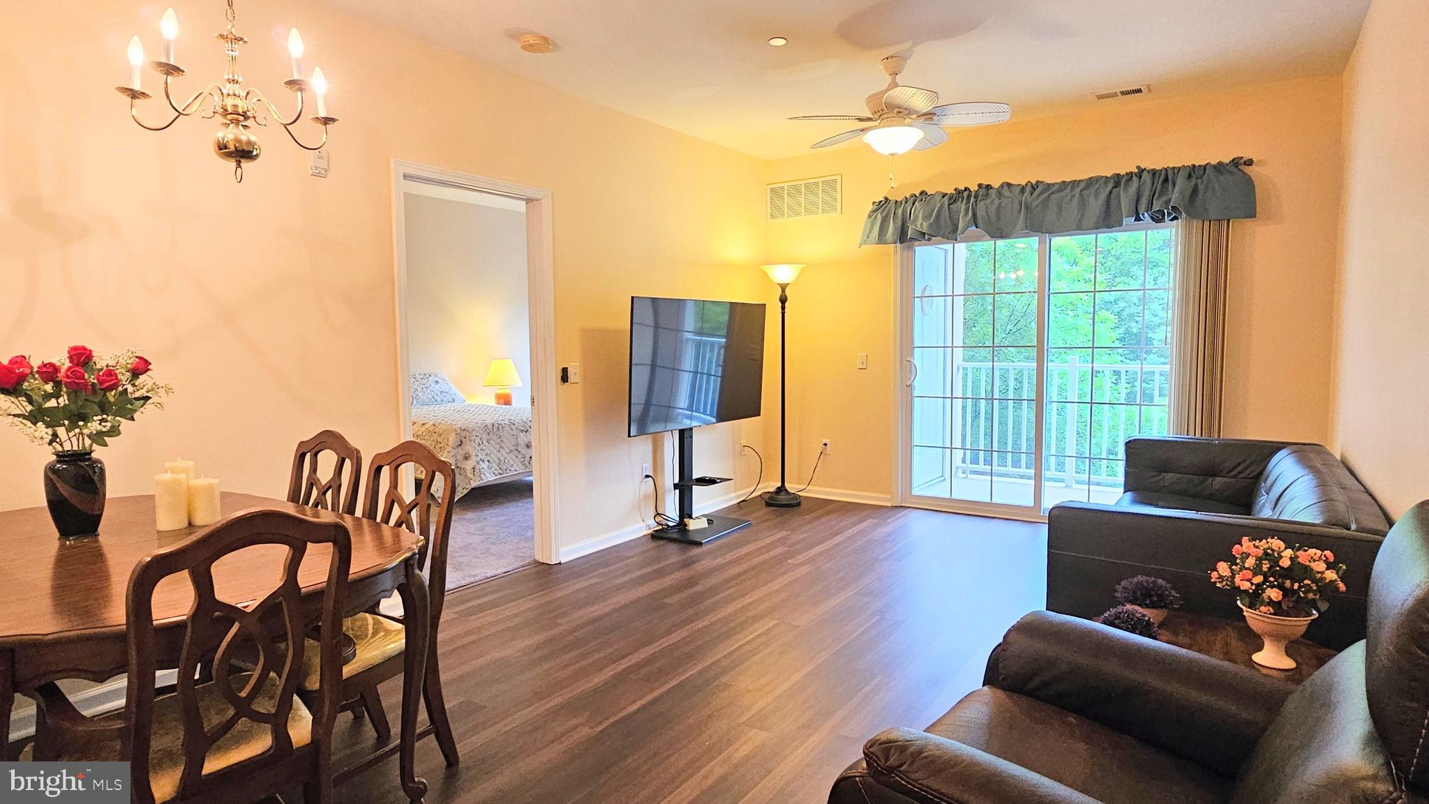 1309 Colts, Unit D Lawrence Township, NJ 08648 - Photo 7 of 33 a living room with furniture and wooden floor