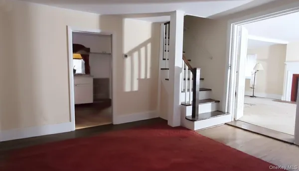 a kitchen with a sink and a refrigerator